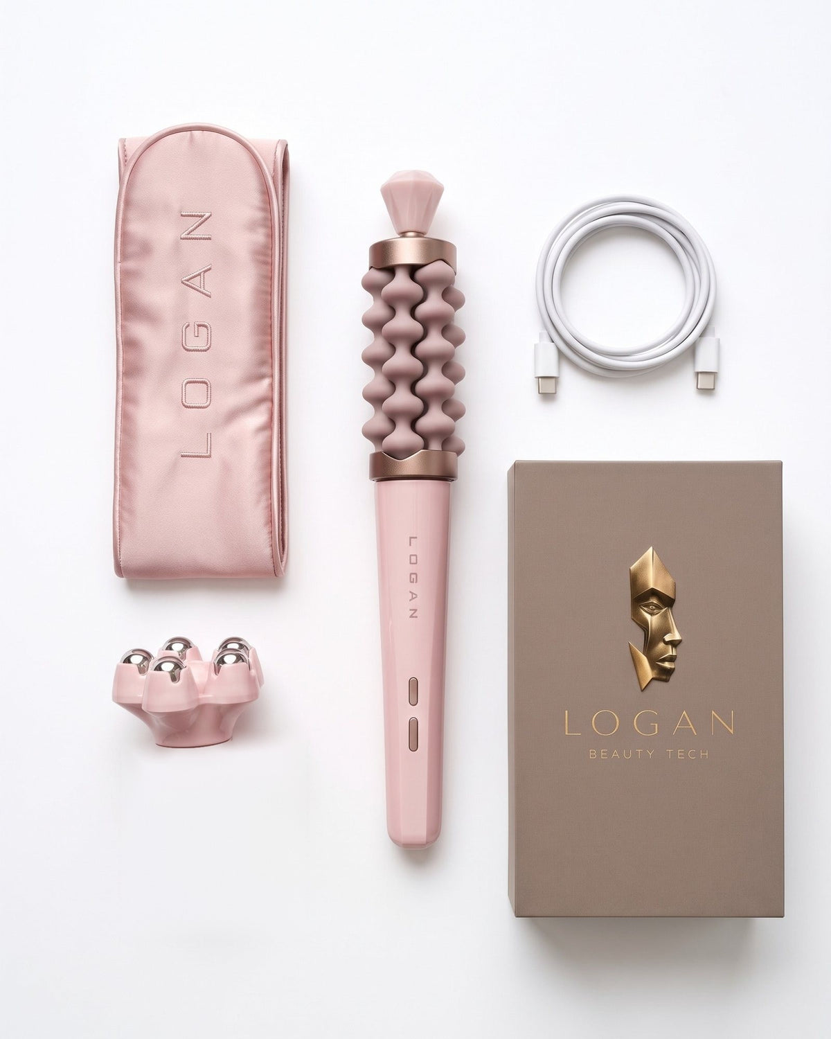 Flat lay of the LOGAN EndoSculpt in Pink Blush with the Cooling Spheres head, silk hairband, USB-C cable and gift box